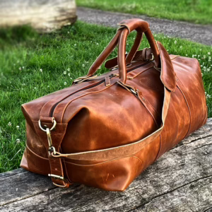 Kalslederen reistas- duffle bag - cognac kleur leder